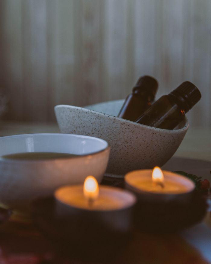 The Art of Drawing Readers In: Your attractive post title goes here A serene spa setting featuring aromatherapy candles and essential oils, perfect for relaxation.